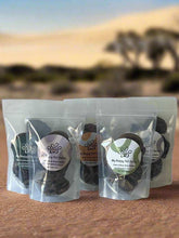Load image into Gallery viewer, GOURMET DEHYDRATED EMU & BUSH PLUM PATTIES in clear packaging, showcasing healthy dog treats.