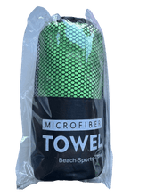 Load image into Gallery viewer, MICROFIBRE PET TRAVEL TOWELS - 60CM X 122CM in a compact green packaging, perfect for beach, gym, and travel.