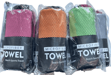 Load image into Gallery viewer, MICROFIBRE PET TRAVEL TOWELS - 60CM X 122CM in various colors, packed and ready for travel, perfect for beach and outdoor activities.