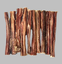 Load image into Gallery viewer, 15cm Aussie Bully Sticks for Dogs arranged on a gray background, showcasing high-quality Australian beef treats.