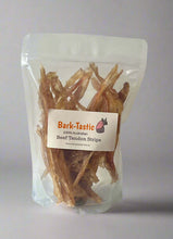 Load image into Gallery viewer, BARK-TASTIC BEEF TENDON STRIPS - Small Dogs in a clear bag showcasing dehydrated beef tendon strips.