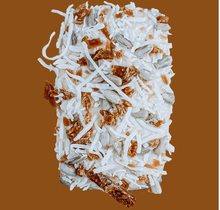 Load image into Gallery viewer, Delicious DOGGY NUTRIBAR topped with coconut and sunflower seeds, perfect for your dog's treat time.