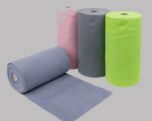 Load image into Gallery viewer, MICROFIBRE TEAR-AWAY CLEANING CLOTHS in four colors including blue, pink, grey, and green on a roll.