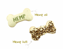 Load image into Gallery viewer, HEMP COOKIES shaped like bones with hemp oil and hemp hull details, highlighting their nutritious ingredients.