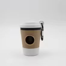 Load image into Gallery viewer, Reusable coffee cup with a brown sleeve and white base on a white background