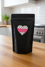 Load image into Gallery viewer, PEANUT BUTTER OAT DOG COOKIES packaging displayed in a kitchen, featuring a heart-shaped label.