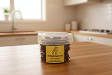 Load image into Gallery viewer, Dehydrated rabbit liver dog treat in a clear container, premium quality pet snack for dogs, rich in protein.