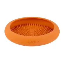 Load image into Gallery viewer, LICKIMAT UFO FEEDER in orange, designed for feeding small to medium dogs, dishwasher and microwave safe.