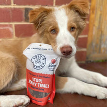 Load image into Gallery viewer, STOP! JERKY TIME! - Kangaroo treats displayed by a dog, showcasing healthy jerky snacks for training.