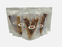 Load image into Gallery viewer, Six packages of dog treats on a white background.
