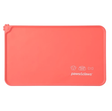 Load image into Gallery viewer, NON SLIP SILICONE FOOD MAT in coral color with paw print design for pet feeding area
